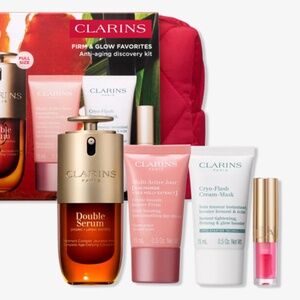 Clarins anti aging holiday kit . With red satin bag. New !
